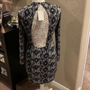 H & M stretch poly dress with cut out back, size 6